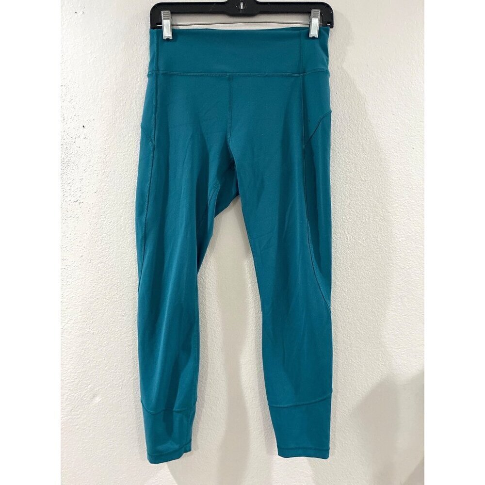 Lululemon Athletic womens high-rise crop leggings in a teal color size 8